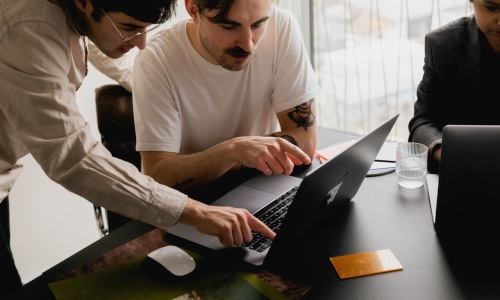 people working at desks