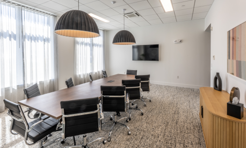 large conference room with table and chairs